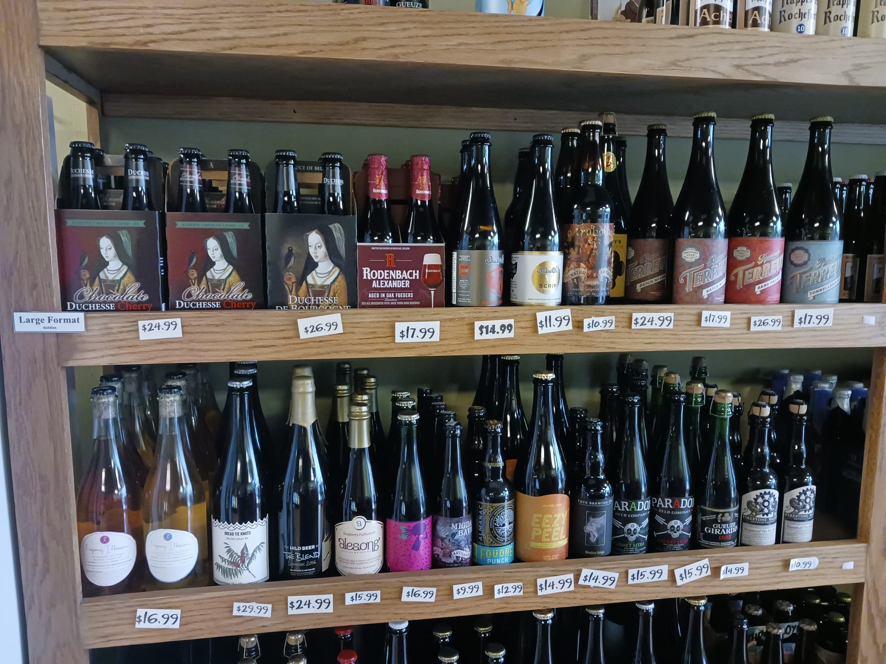 Large-format Belgian and wild ale bottles at De Fles Winkel